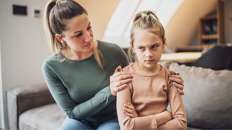 Mother trying to help her frustrated and irritable child